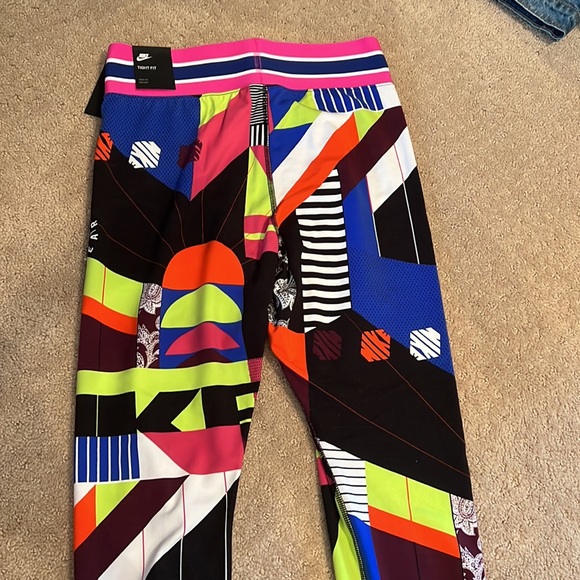 Nike NWT leggings size medium. Super fun and vibrant. - Picture 3 of 12
